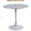 Small round tulip dining table styled in a cozy home breakfast nook for two to four people