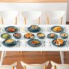 Close-up of the ZERMATT stoneware dinner plate featuring natural weathered rock textures