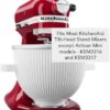 The KitchenAid ice cream maker attachment connected to a tilt-head stand mixer for churning.