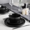 Full service for 4 including dinner plates, salad plates, and deep bowls