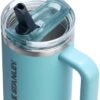 Side profile of the 30 oz Stanley Quencher flip straw tumbler showing the textured comfort-grip handle.