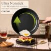Black non-stick Carote cookware set displayed on a modern kitchen countertop