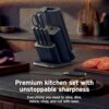 Professional chef knife from the Ninja NeverDull set slicing through fresh ingredients