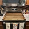 The Gashell 29.5 by 22 inch noodle board used as a farmhouse decor piece in a kitchen