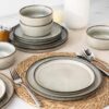 The full GBhome 12-piece ceramic dinnerware set including dinner plates, dessert plates, and cereal bowls.