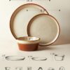 Stack of durable, chip-resistant ceramic dinnerware set plates and bowls in a warm, elegant reactive hue.