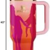 Side profile of the Barbie Stanley tumbler 40oz with its ergonomic comfort-grip handle.