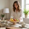 Travertine fruit bowl styled with fresh lemons on a dining table