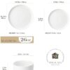 A neatly stacked pile of MALACASA LUNA plates and bowls demonstrating the set's space-saving design.