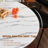High-angle shot highlighting the compact footprint of this white tulip table perfect for apartments