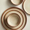 Table setting using the Pokini ceramic dinnerware set, showcasing the low-curved design of the 5.3-inch cereal bowls.
