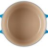 A side profile of the 6.5qt Le Creuset deep oven highlighting its tall sides for splatter reduction.