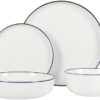 Side profile view of the Gibson Home Oslo porcelain dinnerware stack highlighting the durable glazed finish