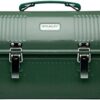 The Stanley metal lunch box with a vacuum bottle secured by the internal lid bracket.
