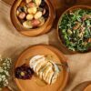 Detailed view of artisanal flecks and reactive glaze on terracotta dinnerware set