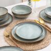 AmorArc ceramic dinnerware set for 8 shown in a cozy home dining environment