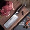 Top-down view of the HOSHANHO Nakiri vegetable knife demonstrating the balanced weight and ergonomic profile.