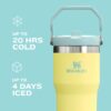 An active person using the Stanley IceFlow tumbler with straw during a workout for cold hydration.