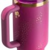 Side-by-side display of the Stanley Barbie tumbler highlighting the glittery pink and purple ombre finish.