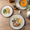 GBhome 12-piece ceramic dinnerware set neatly stacked to demonstrate space-saving storage design.
