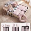 Non-see-through privacy design of the packing cubes featuring convenient carry handles and ID slots.