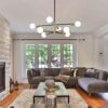 Dining room interior featuring the modern sputnik chandelier at its maximum 50.8-inch hanging height.
