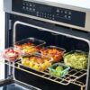 Oven-safe glass containers from the 40pc Le'raze set being used for baking a casserole.