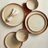 Top-down view of the Pokini ceramic dinnerware set, emphasizing the spacious base of the 10-inch dinner plates.