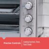 View of the air fry toaster oven in action, perfectly toasting six slices of golden-brown bread.