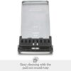 Demonstration of the slide-out crumb tray for easy cleaning of the 4 slice stainless steel toaster.