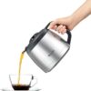 In-use shot of the Breville coffee maker with grinder brewing directly into a tall travel mug.