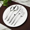 A table setting featuring the Stilloye 60 piece stainless steel silverware set for a formal dining look.