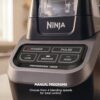 Side profile of the Ninja professional blender for ice showcasing its sleek design and simple interface.