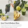 Action shot of the Hurom H70 processing fresh fruits and vegetables into smooth, nutrient-rich juice.