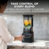The Ninja UltraCrush professional ice crushing blender preparing frozen drinks with its powerful 1000W motor.