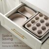The Carote 7-piece nonstick bakeware set neatly stacked to save cabinet space