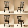 Group of six Dkpmrz black dining chairs showcased in a spacious interior to highlight their timeless style.