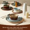 Lead-free ceramic dinnerware set being placed in a microwave, demonstrating the durable and heat-safe material.