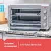 The BLACK+DECKER air fry toaster oven with its easy-clean external crumb tray pulled out.