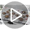 The 12-piece brown dinnerware set displayed in a modern kitchen, emphasizing its scratch-resistant surface.