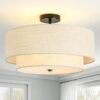 Wide shot of the modern farmhouse ceiling light fixture installed gracefully in a hallway entry